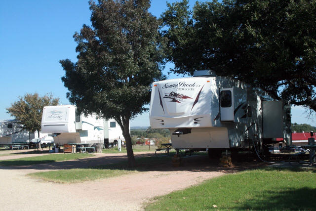 Shaded RV sites available at Peach Country RV Park near Fredericksburg, TX.